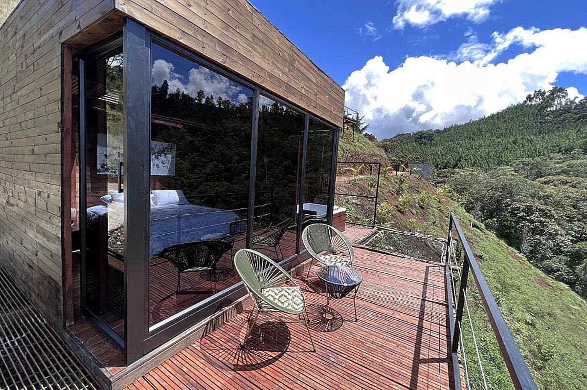 Private cabin exterior surrounded by forest at Yaogara