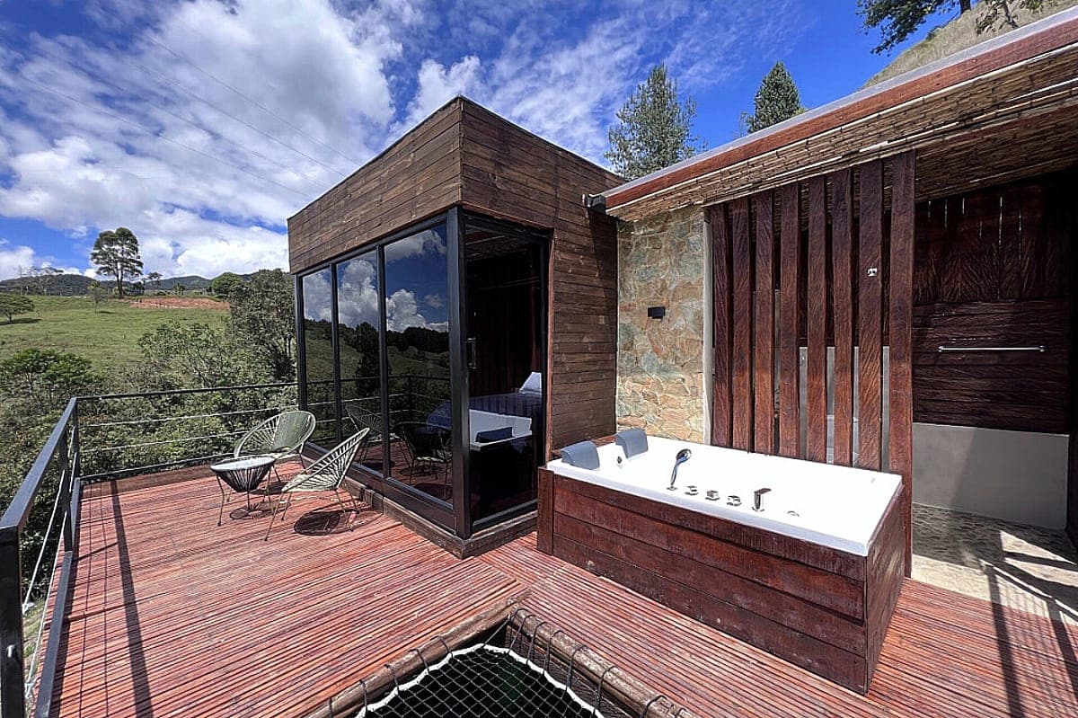 Private cabin terrace with outdoor soaking tub at Yaogara